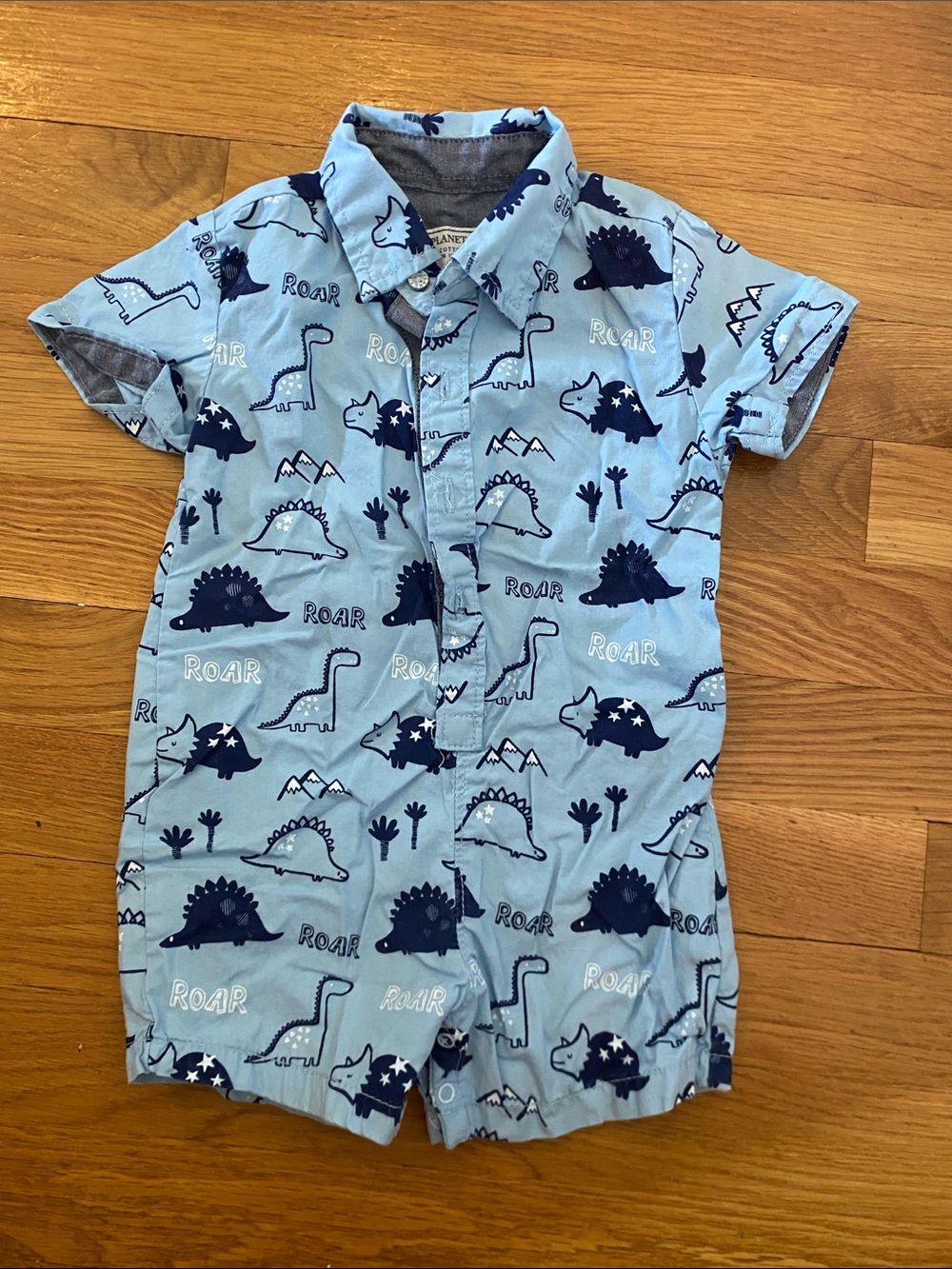 Free Planet Light Blue Navy Dinosaur Print One-Piece